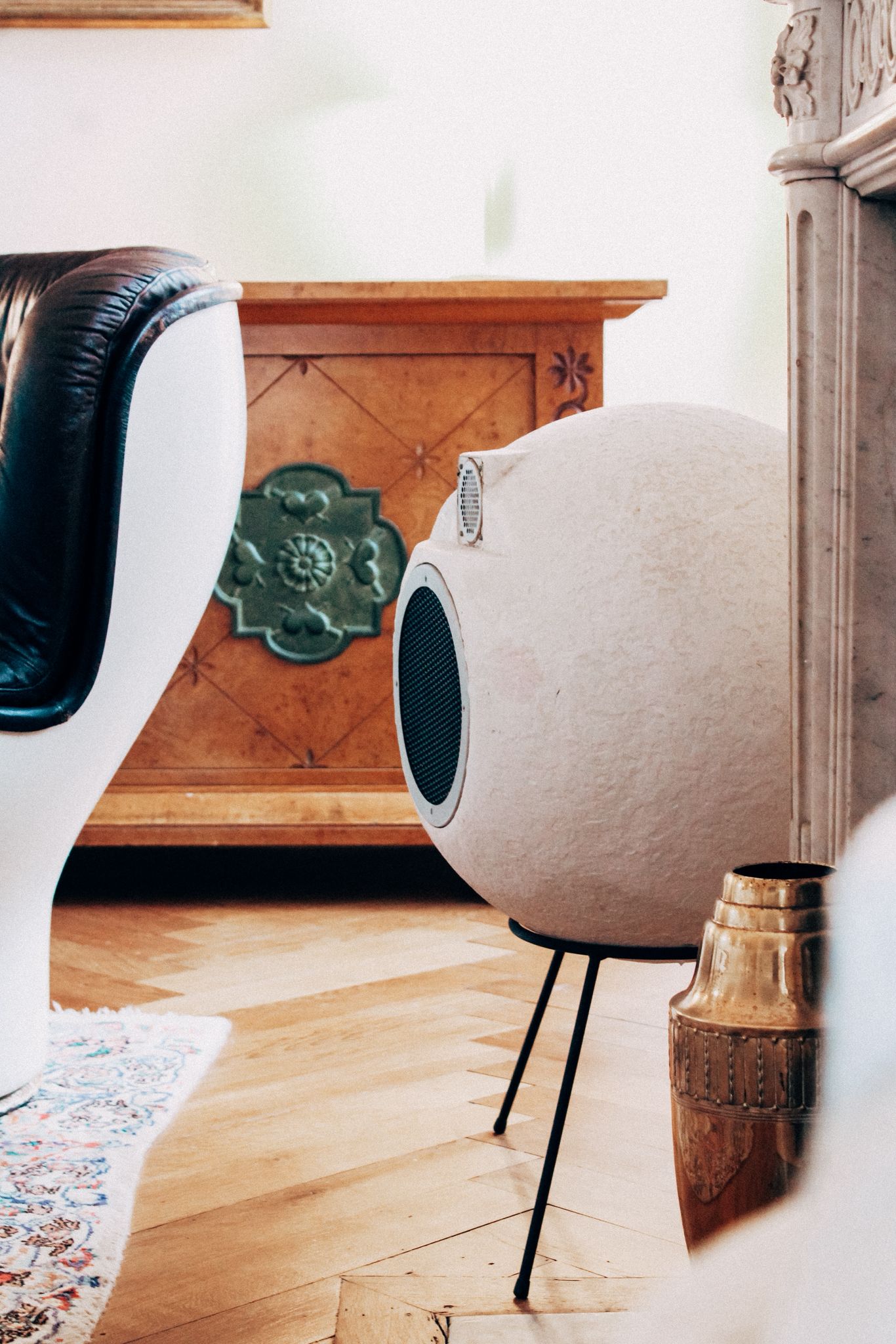 Globe speaker and antique sideboard