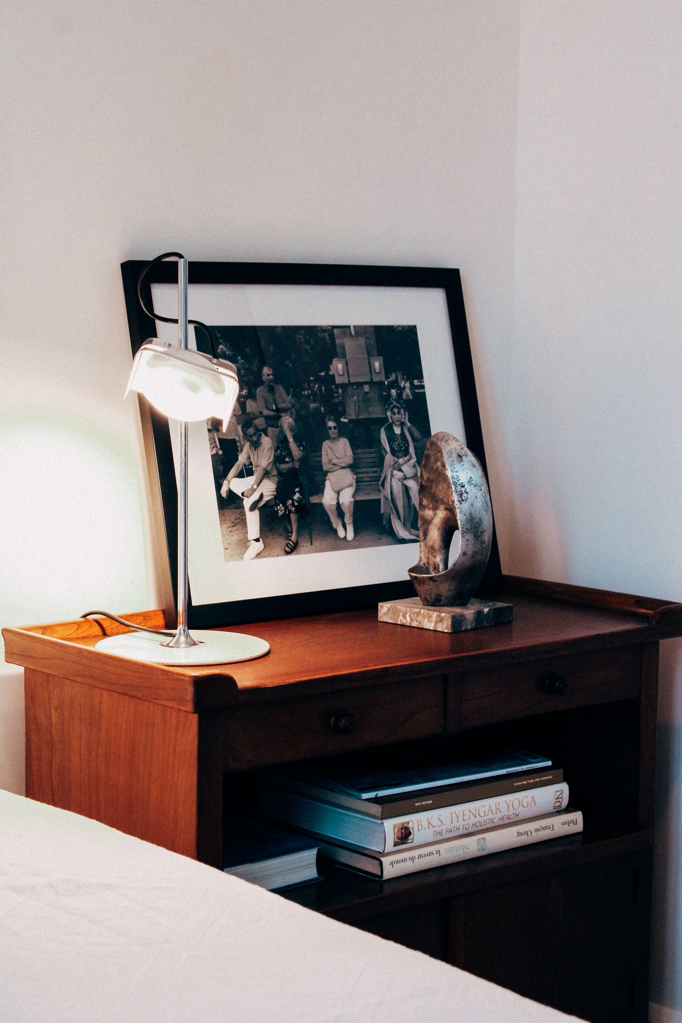 Bedside lamp and books